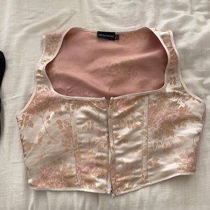 Pretty little thing corset top with zipper in the front.
